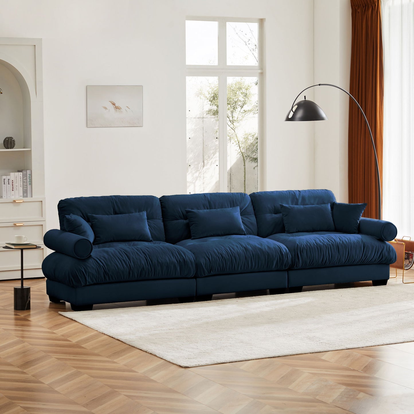 Modern Sofa With Bolstered Armrests And Pillows